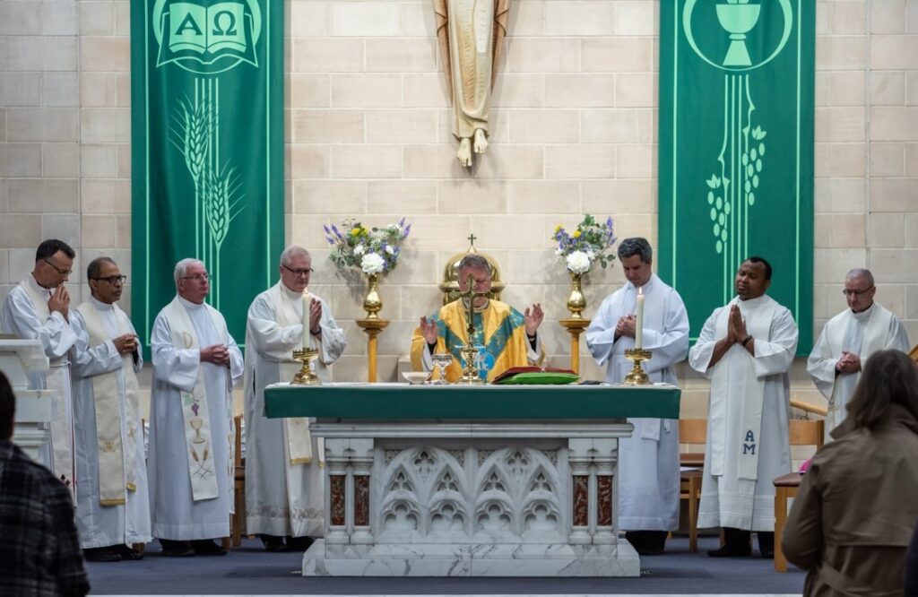 Divine Renovation priests from the UK, gathered at a parish together during the celebration of the Holy Mass